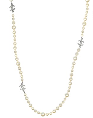 Lot 576 - A Chanel faux pearl and gold-tone CC crystal set necklace.