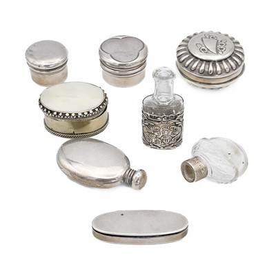 Lot 408 - A collection of silver boxes and scent bottles.