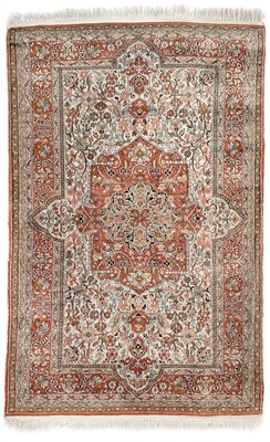 Lot 1 - An Indian silk rug, mid 20th century.