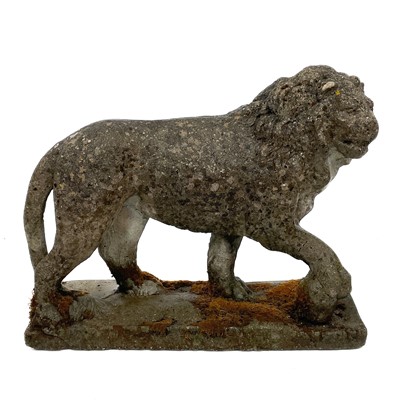 Lot 1003 - A reconstituted stone lion figure.