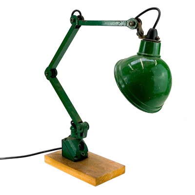 Lot 144 - An industrial adjustable lamp.