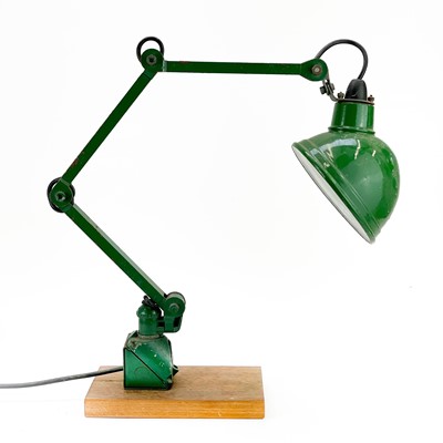 Lot 144 - An industrial adjustable lamp.