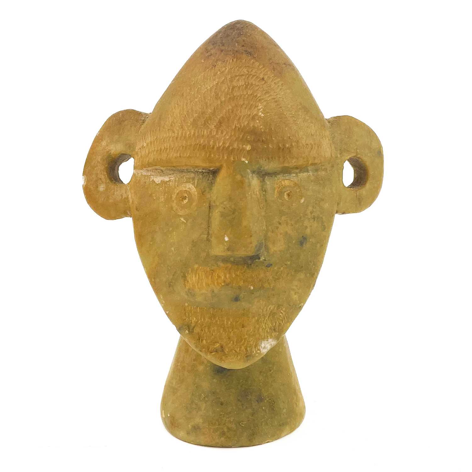 Lot 125 - A carved soapstone tribal head.