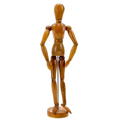 Lot 126 - A wooded articulated artists mannequin.