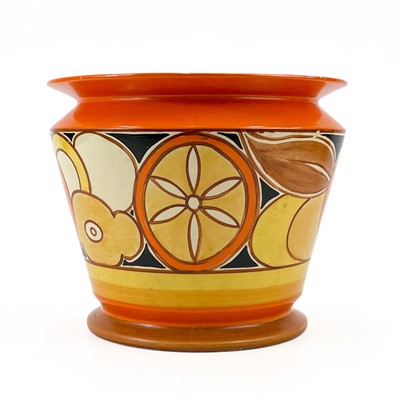 Lot 526 - A Clarice Cliff sliced fruit (orange) pattern footed jardiniere.