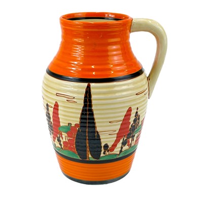 Lot 527 - A Clarice Cliff Trees and Houses (red) pattern single handled lotus jug.