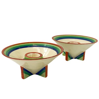 Lot 558 - A pair of Clarice Cliff banded ware pattern candle holder shape 384.