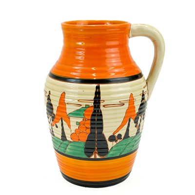 Lot 563 - A Clarice Cliff Trees and Houses (orange) Lotus single handled jug.