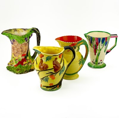 Lot 904 - A Grindley Art Deco pottery jug and three others.