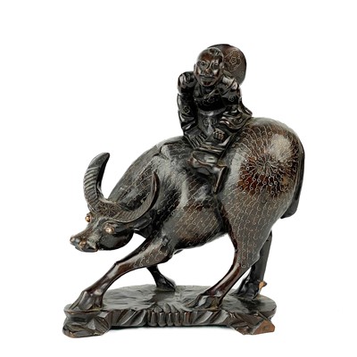 Lot 175 - A Chinese carved wood model of a buffalo, circa 1900.