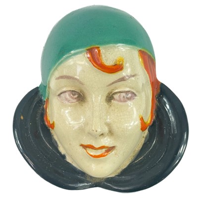 Lot 908 - A group of six Czech and other Art Deco face masks.