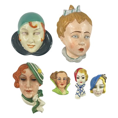 Lot 908 - A group of six Czech and other Art Deco face masks.