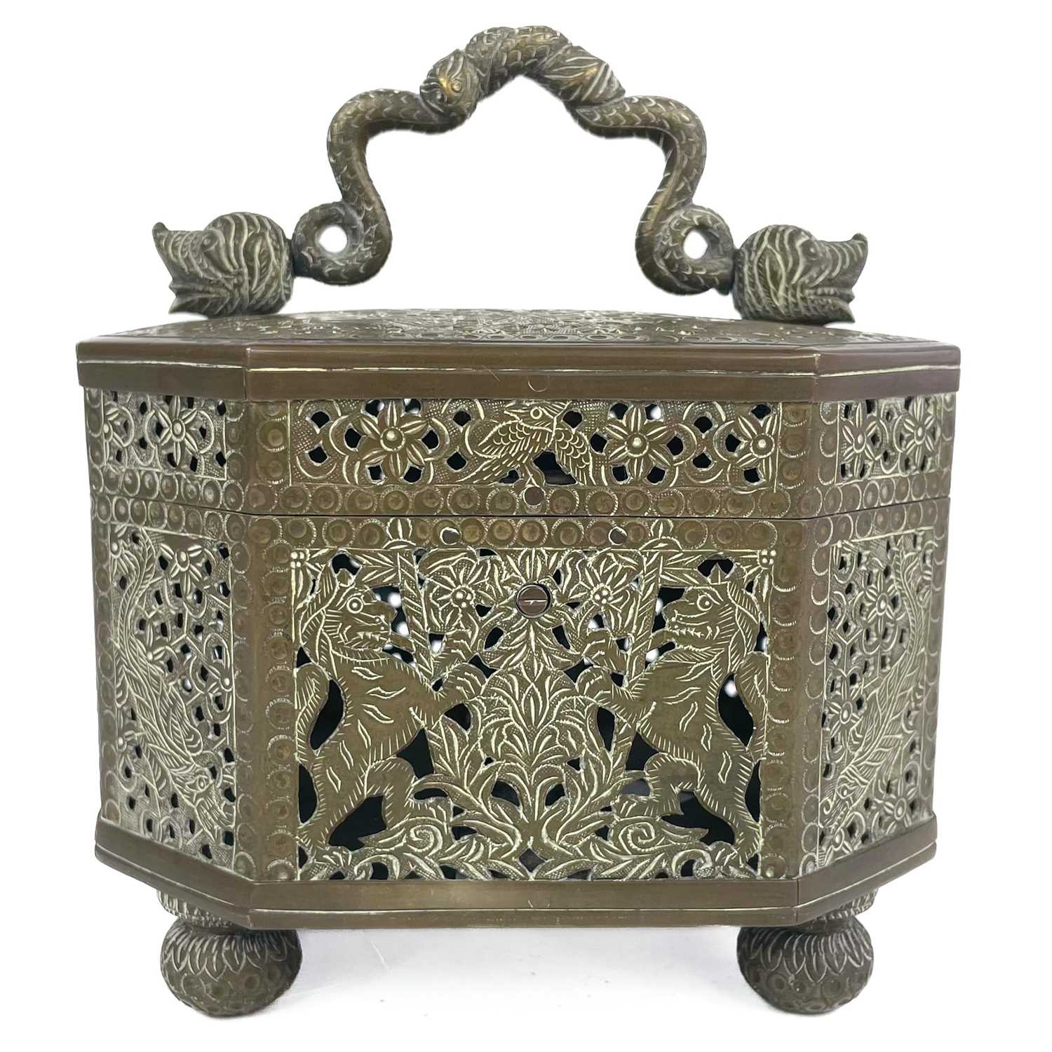 Lot 279 - An Indian pierced brass octagonal cricket cage, 19th century