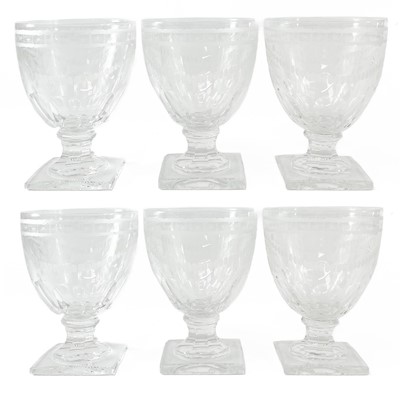 Lot 919 - A set of six Regency style engraved glass rummers.