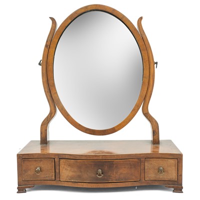 Lot 1807 - A late George III mahogany swing toilet mirror.