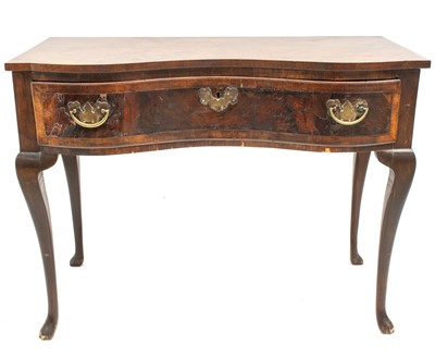 Lot 1842 - A walnut side table, in the early 18th century style.