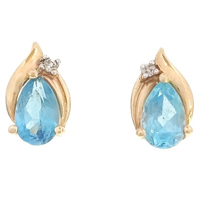 Lot 195 - A pair of modern 14ct gold diamond and zircon stud earrings.