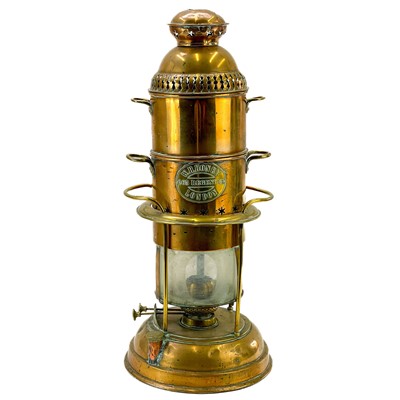 Lot 190 - A Victorin copper and brass oil lamp room heater.