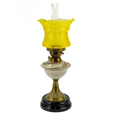 Lot 194 - A Victorian brass oil lamp with marble glass reservoir.