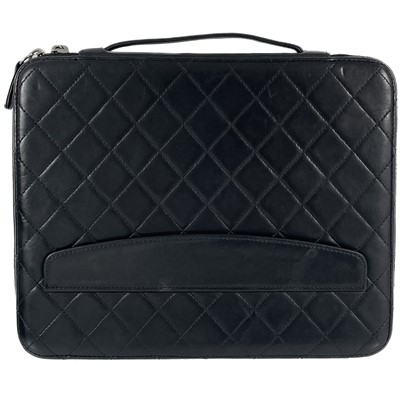 Lot 135 - A Chanel black lambskin quilted leather mini ipad case.
