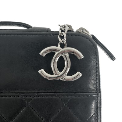 Lot 135 - A Chanel black lambskin quilted leather mini ipad case.