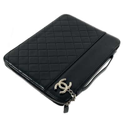 Lot 135 - A Chanel black lambskin quilted leather mini ipad case.