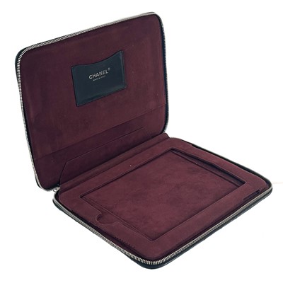 Lot 135 - A Chanel black lambskin quilted leather mini ipad case.
