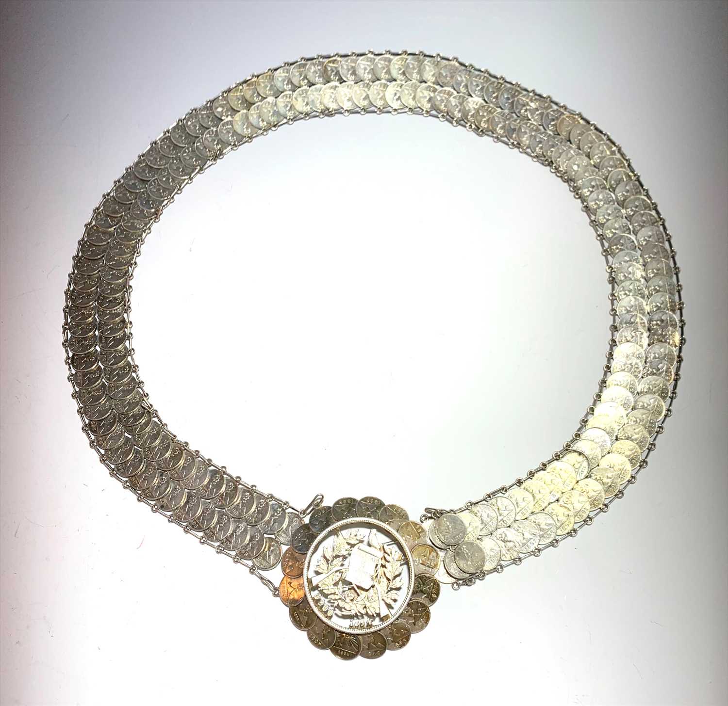 Lot 2478 - A coin belt, made from 1/4 real coins, the...