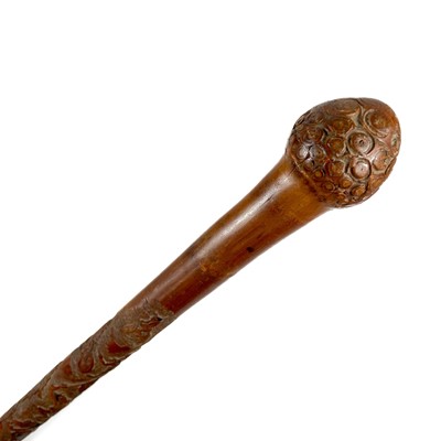 Lot 384 - A Japanese carved bamboo walking cane, early-mid 20th century.