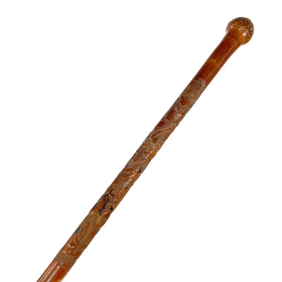 Lot 384 - A Japanese carved bamboo walking cane, early-mid 20th century.