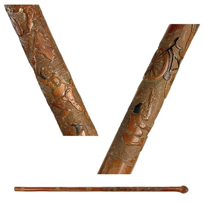 Lot 384 - A Japanese carved bamboo walking cane, early-mid 20th century.