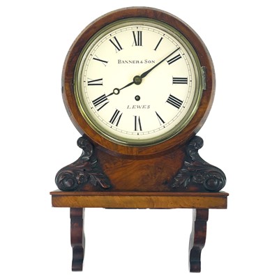 Lot 1707 - A late Victorian walnut cased bracket type wall timepiece.