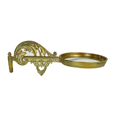 Lot 38 - A Victorian wall mounted brass oil lamp.