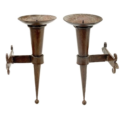 Lot 79 - A  pair of ironmongery wall mounted candleholders.