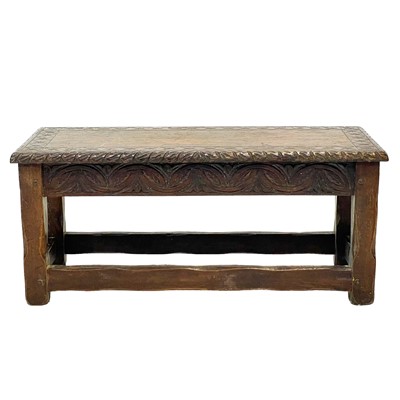 Lot 161 - A late Victorian carved oak long stool.