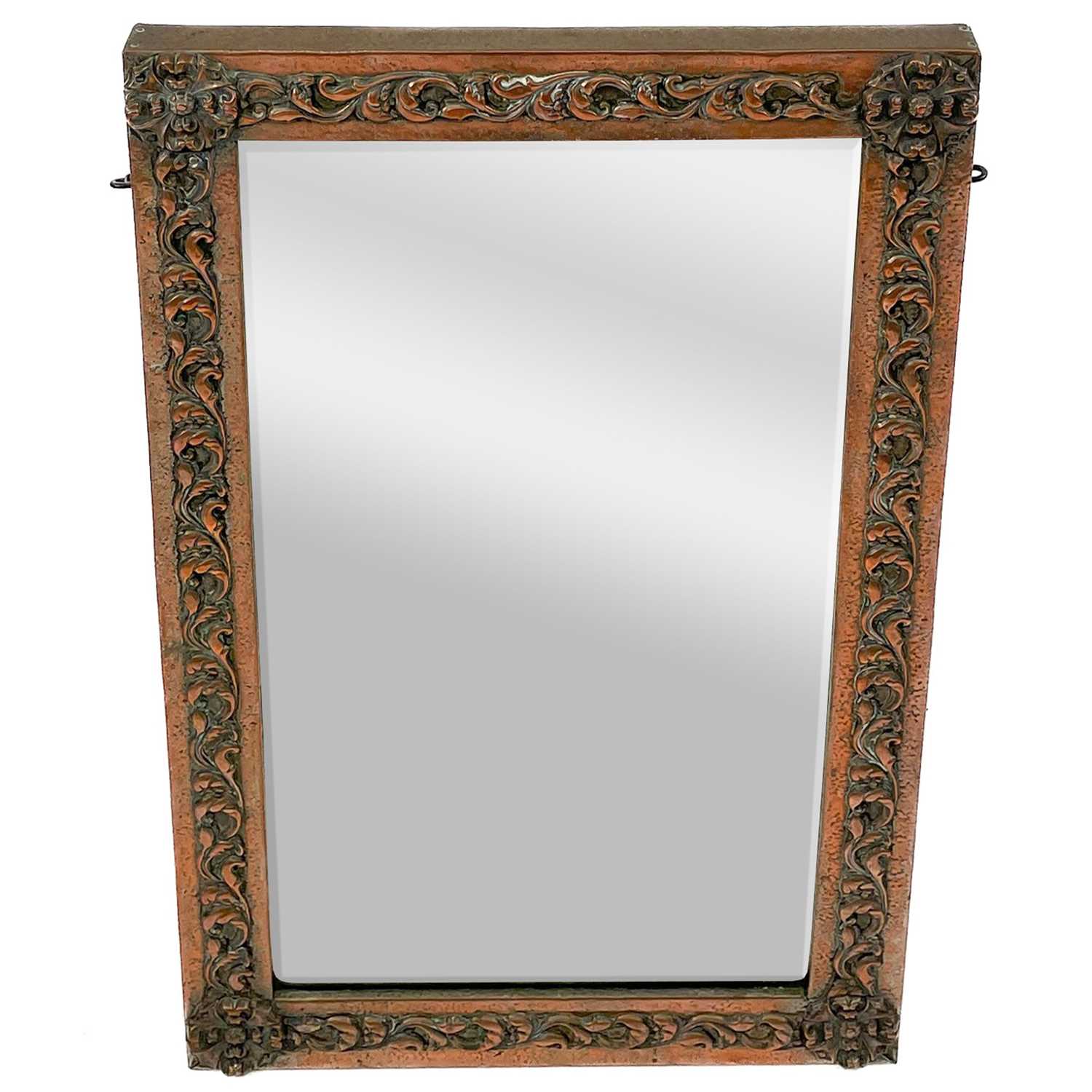 Lot 219 - An Art Nouveau copper frame mirror.