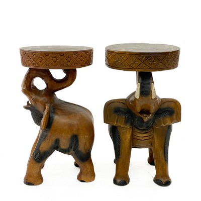 Lot 1817 - A pair of carved hardwood occasional tables.