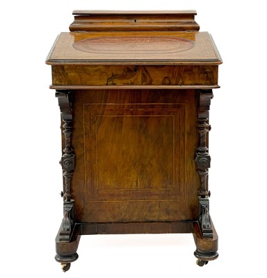 Lot 1913 - A Victorian walnut and satinwood banded Davenport desk.