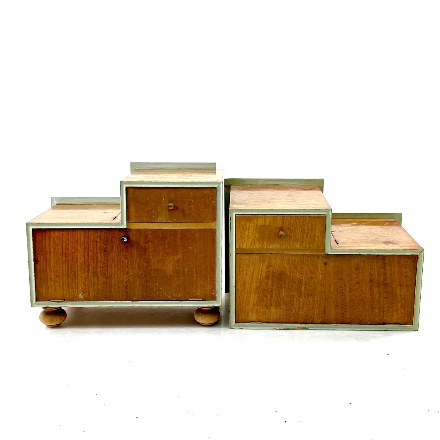 Lot 411 - A pair of Mid-century sapele bedside cabinets.