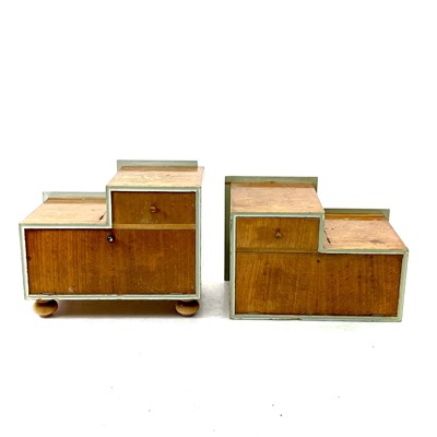 Lot 411 - A pair of Mid-century sapele bedside cabinets.