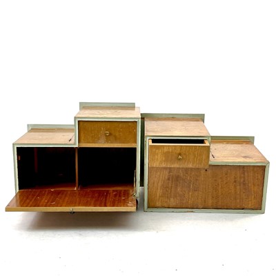 Lot 411 - A pair of Mid-century sapele bedside cabinets.