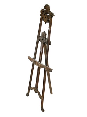 Lot 1914 - A carved hardwood artist's easel.