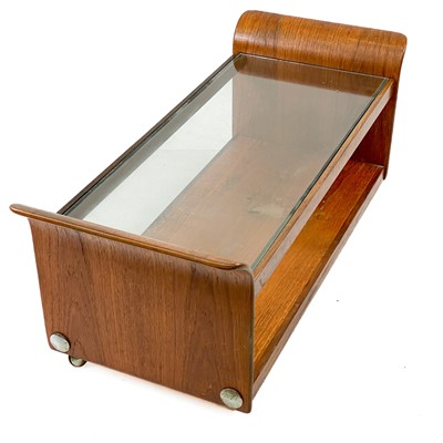 Lot 405 - A G-Plan glass topped teak Tulip coffee table.