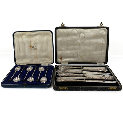 Lot 289 - An Edwardian silver handled set of six fruit knives by William Hutton & Sons.