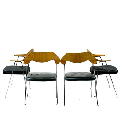 Lot 418 - Four After Robin Day elbow chairs.