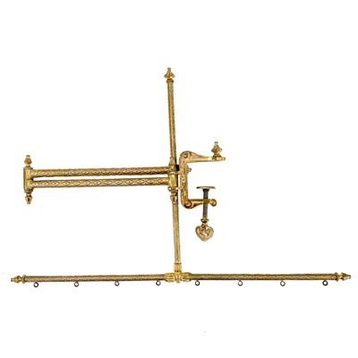 Lot 81 - A gilt metal tapestry adjustable frame with ornate clamp.