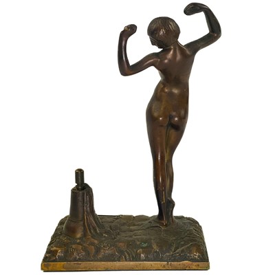 Lot 499 - An Art Deco bronze match striker.