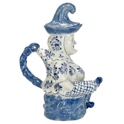 Lot 52 - A Deflt blue and white character jug and cover as Mr Punch.