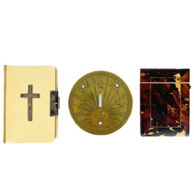 Lot 434 - A Victorian tortoiseshell card case, a prayer book and a brass sundial.