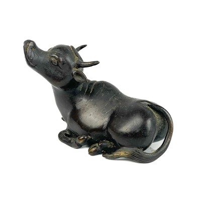 Lot 1246 - A Japanese bronze model of a buffalo, Meiji period.